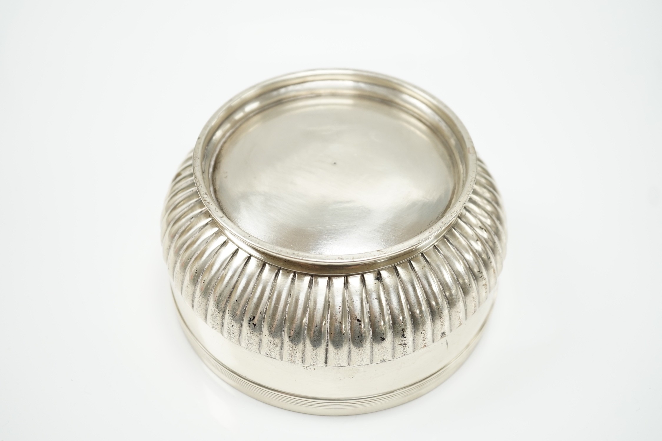 A late Victorian demi fluted silver circular bowl by R & S Garrard & Co, London, 1894, 14.1cn diameter, 14.6oz.